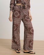 Veronica Beard Brown patterned wide-leg pants with drawstring waist.