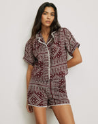 Veronica Beard Maroon paisley short-sleeve pajama top with white trim.