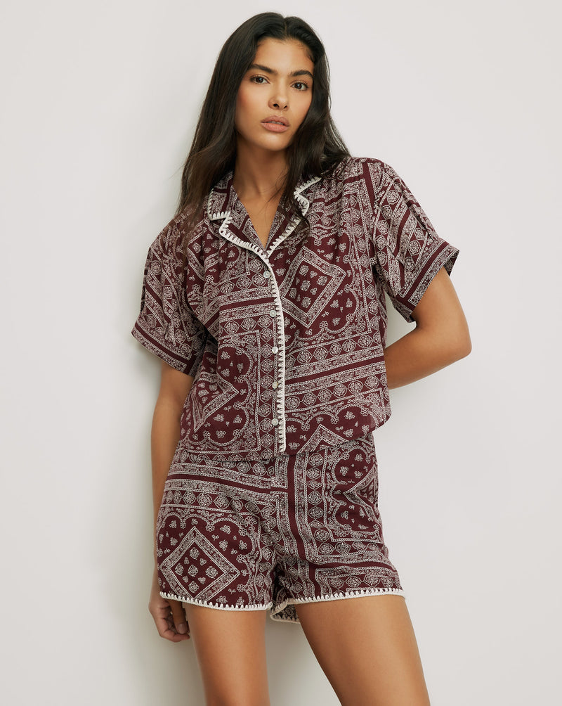 Veronica Beard Maroon paisley short-sleeve pajama top with white trim.