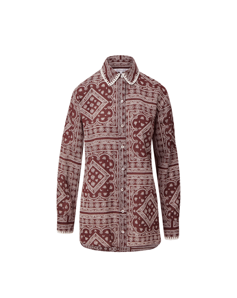 Veronica Beard Red paisley button-down shirt with white collar trim.