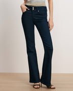 Veronica Beard Dark wash flare jeans with double-button closure.