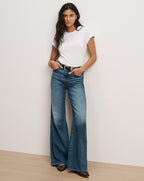 Veronica Beard White t-shirt, blue jeans, black belt
