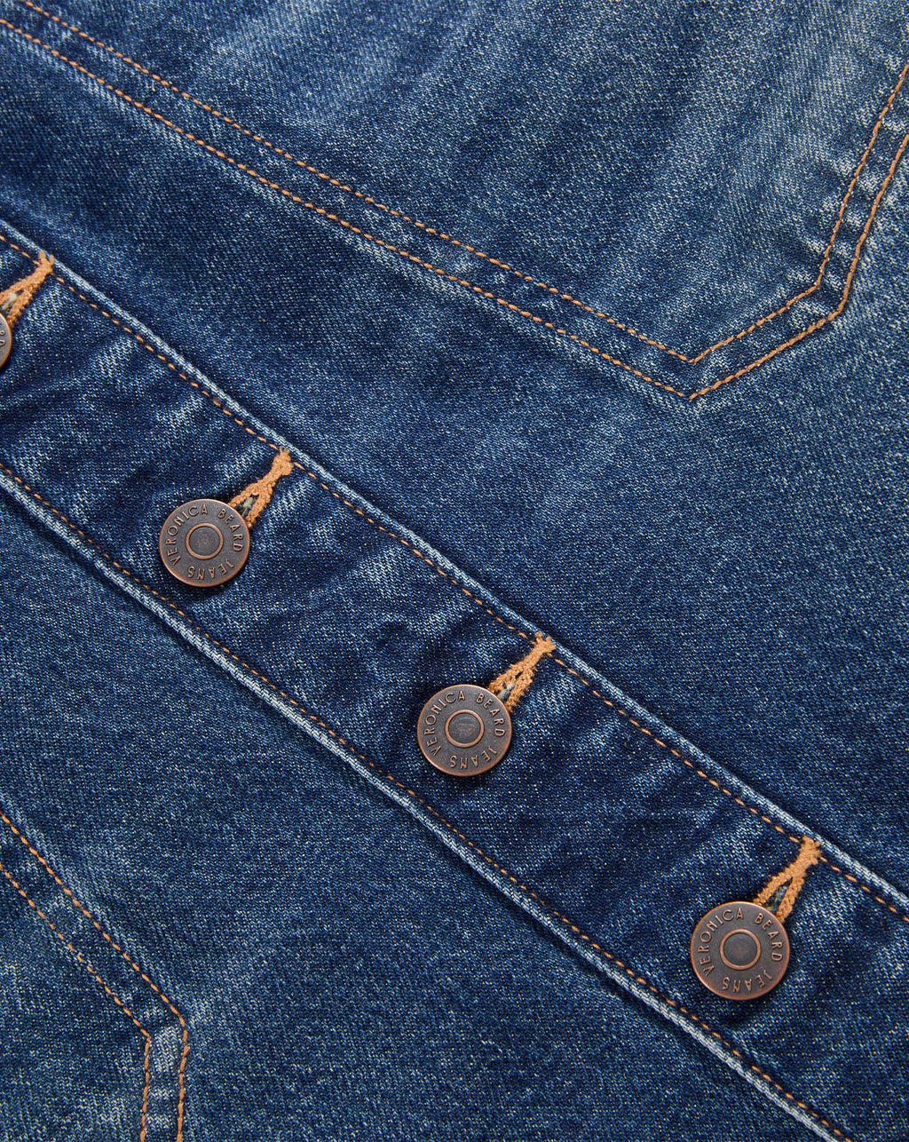 Veronica Beard Blue denim jacket with bronze tone buttons.