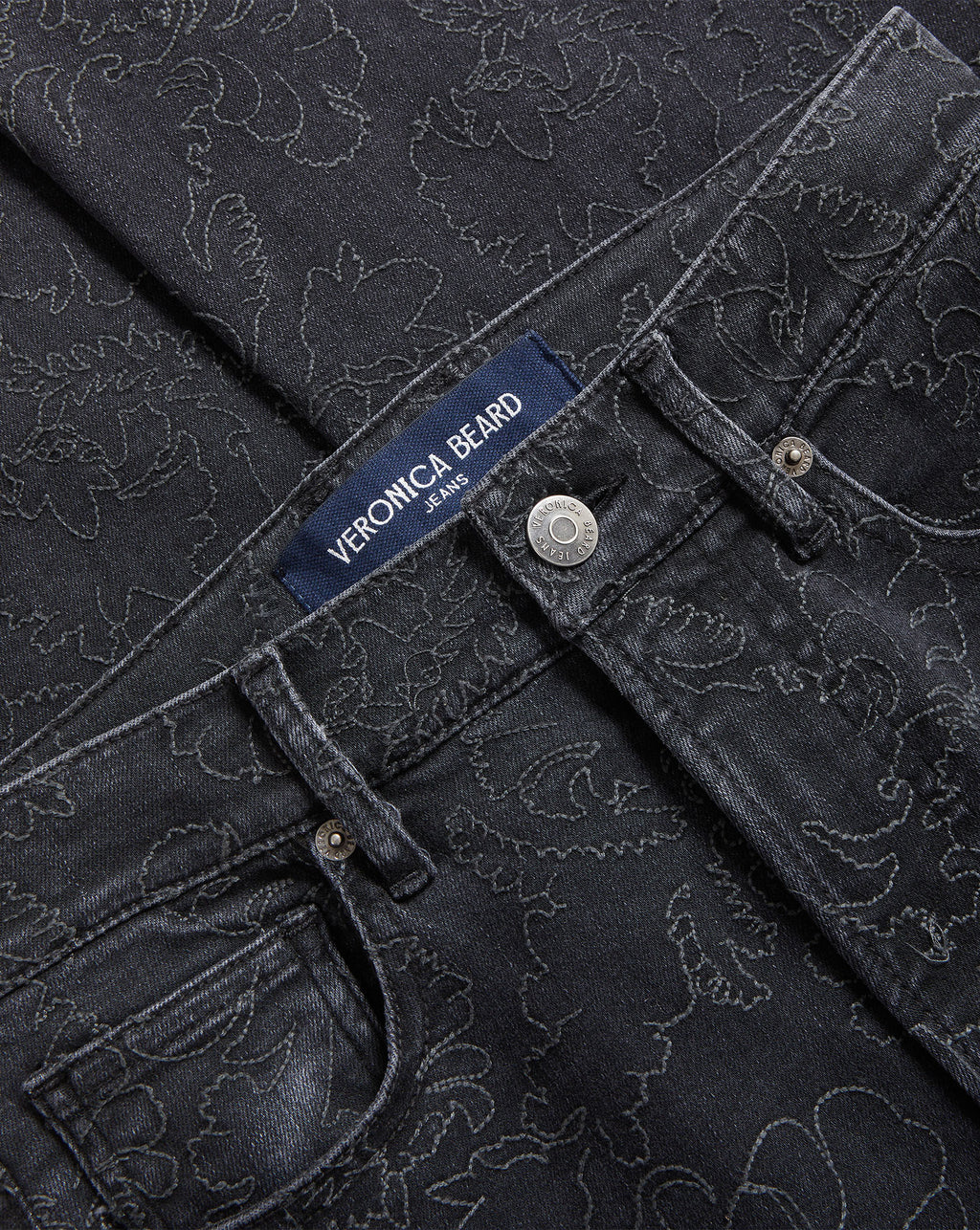 Veronica Beard Black patterned denim jeans with branded hardware.