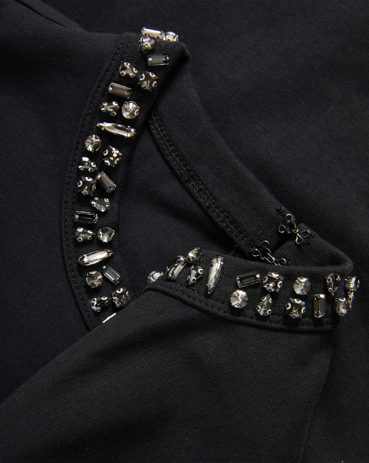 Veronica Beard Black garment with crystal embellished mock neck.