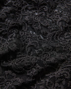 Veronica Beard Black lace fabric with intricate floral pattern.