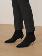 Veronica Beard Black suede pointed-toe ankle boots with kitten heels.