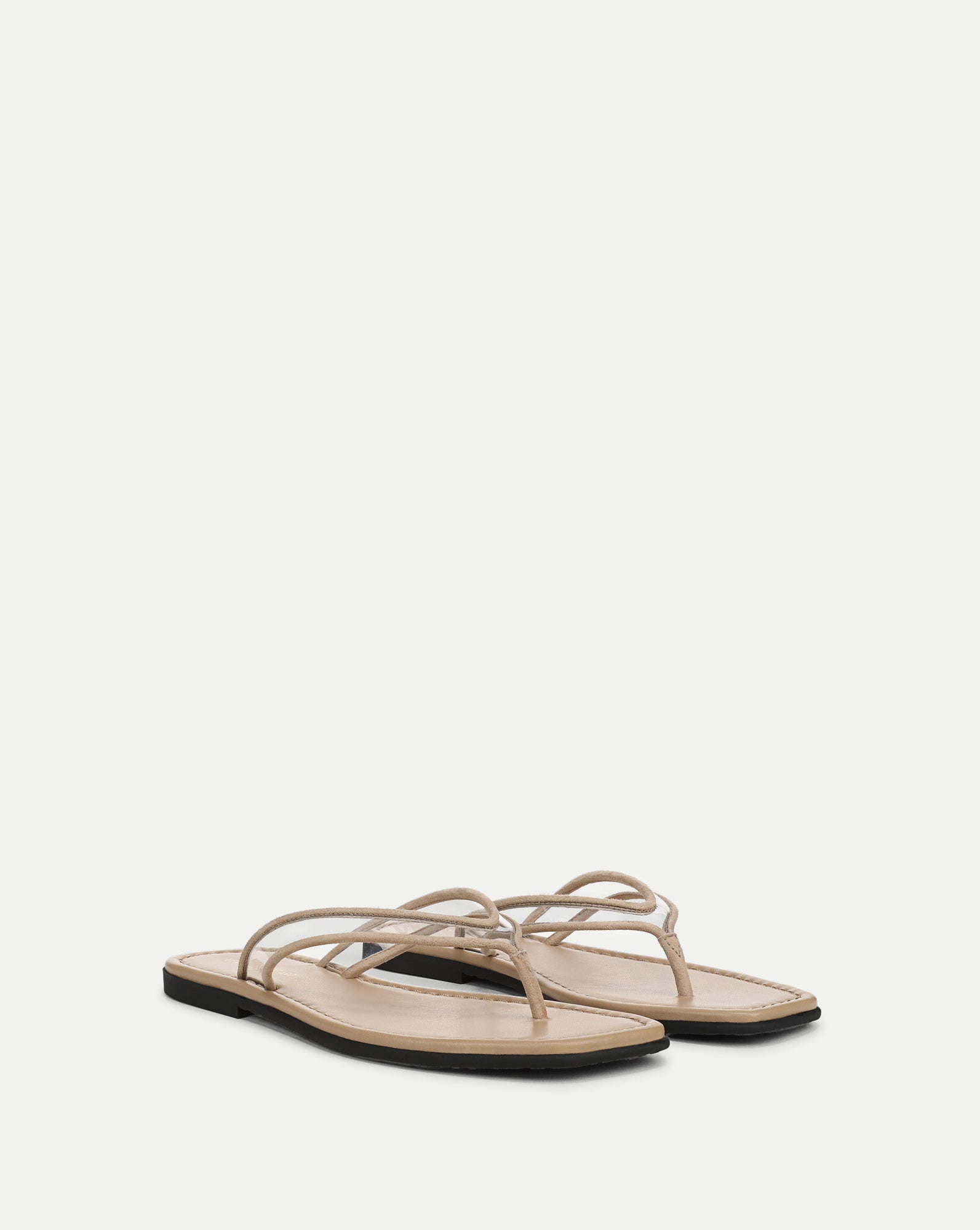 Veronica Beard Beige leather flat sandals with thin straps.