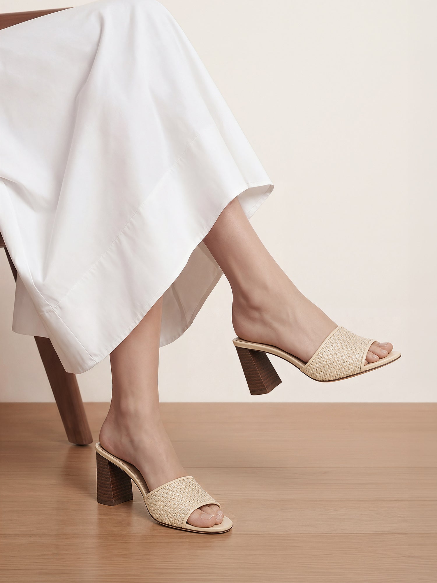 Veronica Beard Beige woven raffia mules with wood block heels.