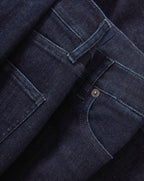 Veronica Beard Dark wash denim jeans with a front pocket and belt loops.