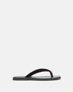 Veronica Beard Black leather sandal with a dark red velvet strap.
