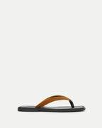 Veronica Beard Brown suede flip-flop sandal with black sole.