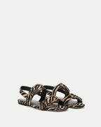 Veronica Beard Zebra print flat sandals with gold buckles