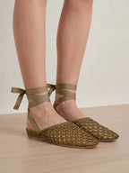 Veronica Beard Olive green woven leather mule with ankle ribbon.