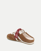 Veronica Beard Brown suede mule sneaker with white stripes and red laces.