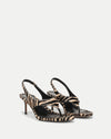 Veronica Beard Zebra print calf hair thong sandals with stiletto heels.