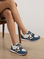 Veronica Beard White, blue, and maroon athletic sneakers with white laces.