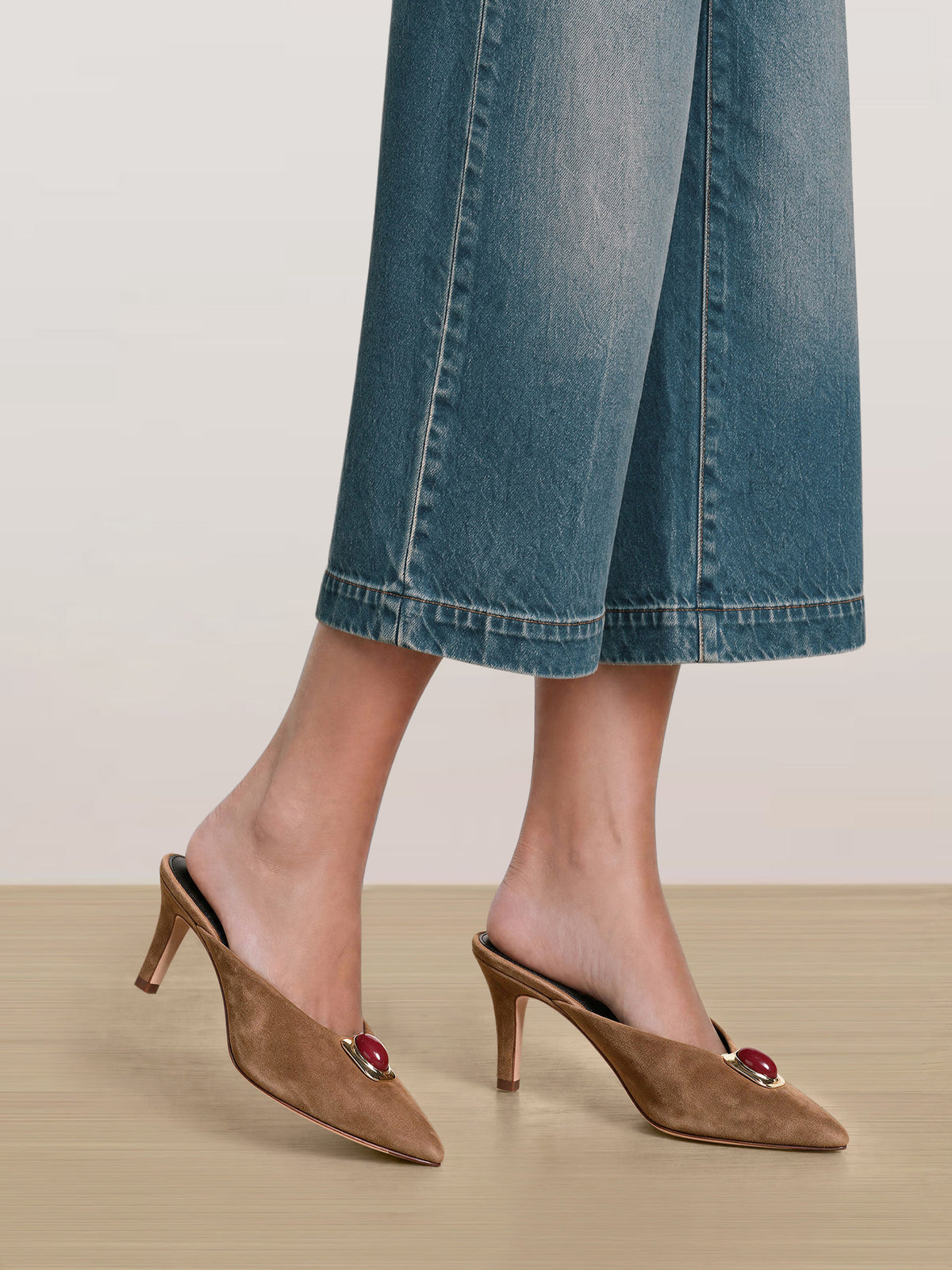 Veronica Beard Brown suede heeled mules with red stone detail.