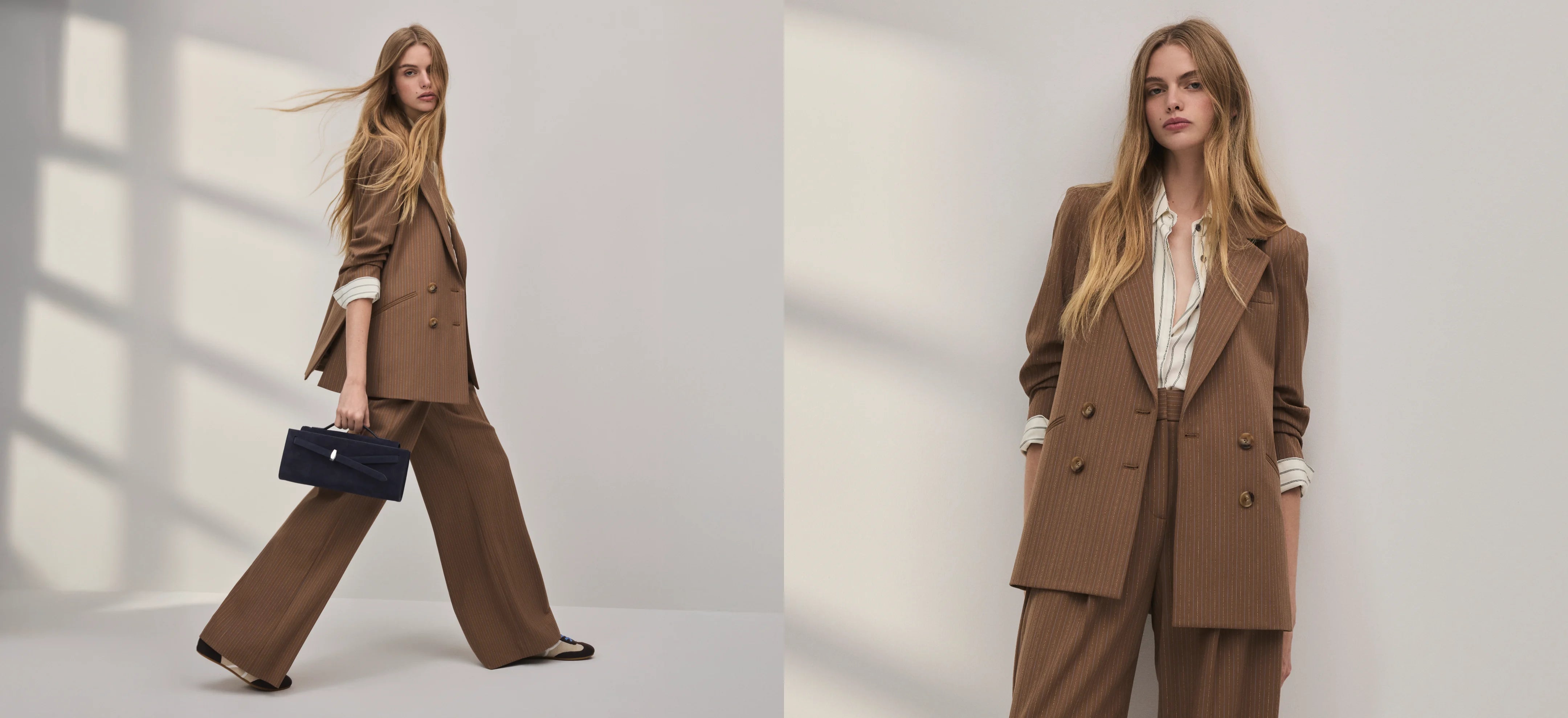 The image depicts two women wearing beige trench coats, standing in a minimalist setting with a plain white background.