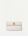 Veronica Beard White leather clutch with gold clasp.