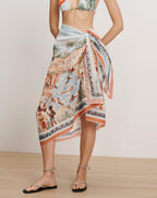 Veronica Beard White and orange sarong with a tropical print.