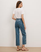 Veronica Beard Blue denim jeans with geometric side panel details.