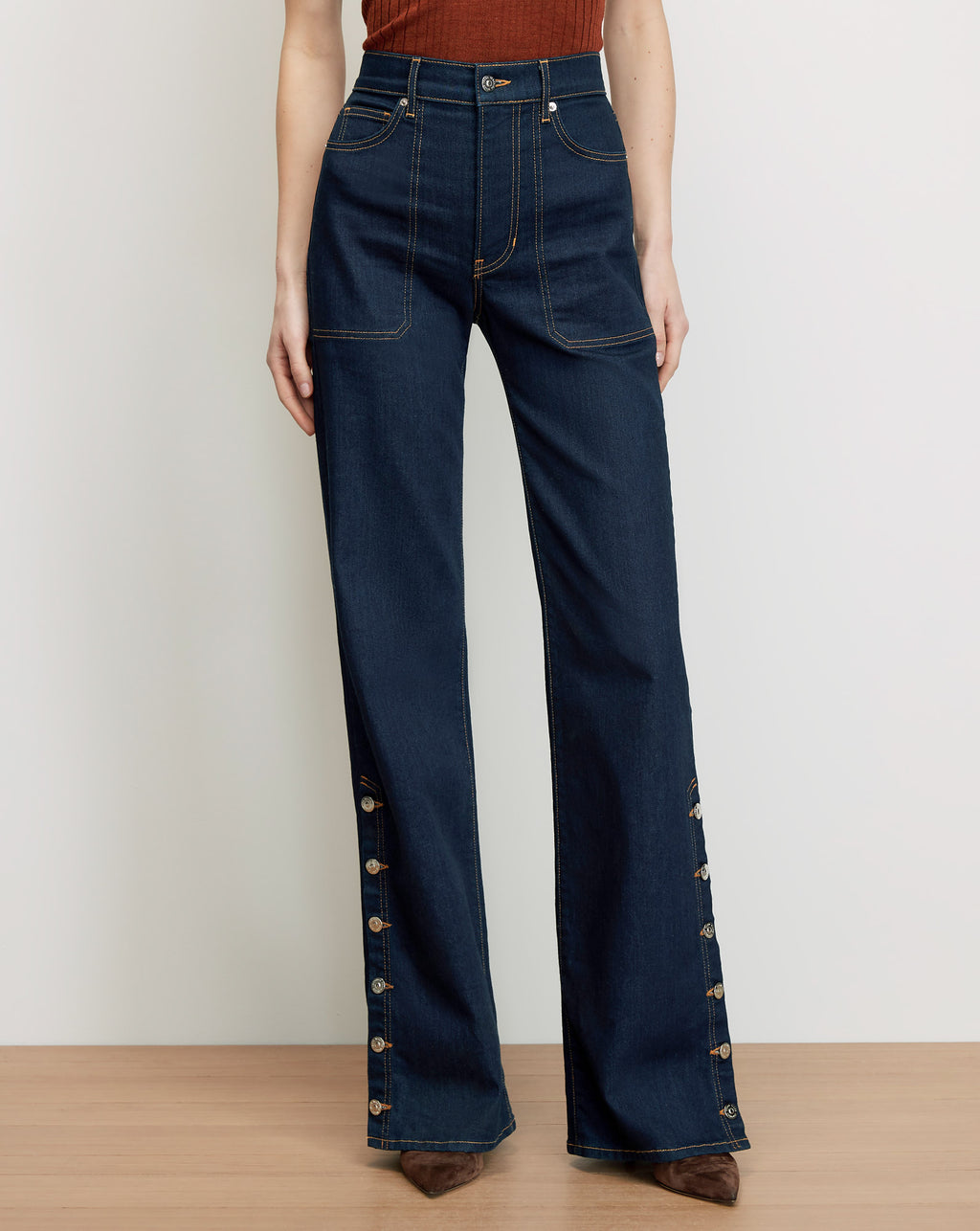 Veronica Beard Dark wash denim wide-leg jeans with side buttons.