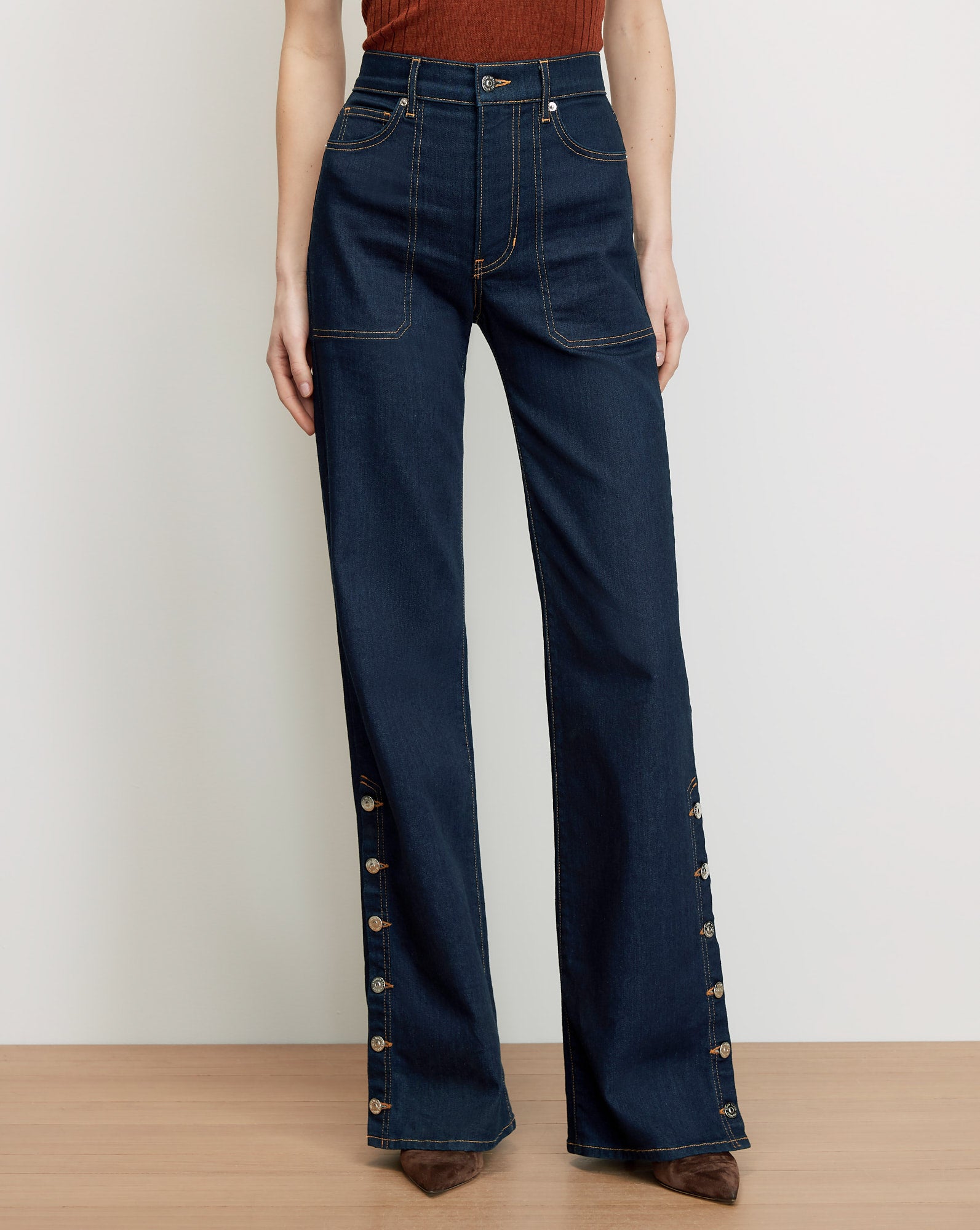 Veronica Beard Dark wash denim wide-leg jeans with side buttons.