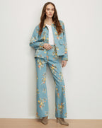 Veronica Beard Blue floral denim jacket and matching flared jeans.
