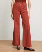 Veronica Beard Rust wide-leg jeans with a high waist.
