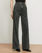 Veronica Beard Gray denim wide-leg jeans with studded side seams.