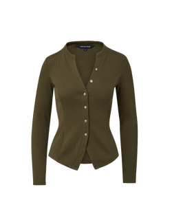 Veronica Beard Olive green ribbed knit cardigan, blue flared jeans.