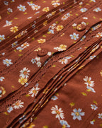 Veronica Beard Brown floral blouse and rust-colored pants