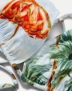 Veronica Beard White bikini with fruit print and side-tie bottoms.