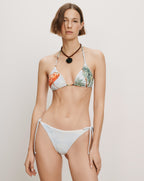Veronica Beard White bikini with tropical print and side-tie bottoms.