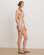 Veronica Beard White bikini with fruit print and side-tie bottoms.