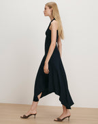 Veronica Beard Black halter dress with asymmetrical hem.