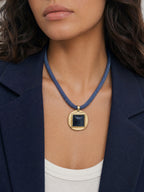 Veronica Beard Blue braided necklace with a gold square pendant