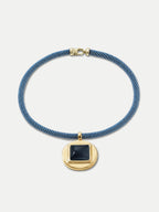 Veronica Beard Blue woven necklace with a gold pendant and