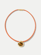 Veronica Beard Orange leather choker with a gold and tiger's